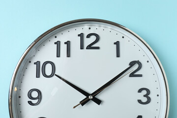wall clock on a blue background
