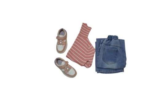 set of children's clothes isolated, clothes for little girl jeans blue golf pink with white stripes and sneakers on white background