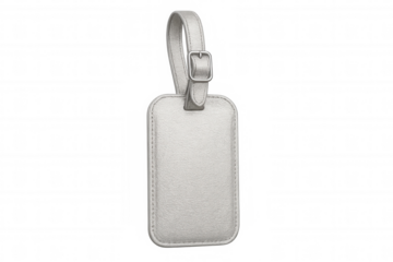 Silver leather luggage tag lying flat, blank surface waiting for custom text, transparent backdrop highlighting clean design