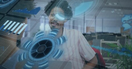 Data analyst looking up as coworker passing by, activating hologram showing charts for business - Powered by Adobe