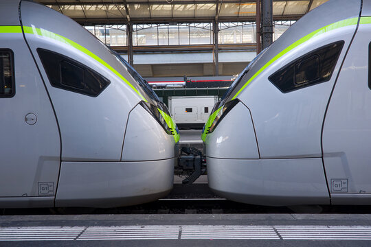 Close-up of gray and green colored Mika BLS Stadler Rail train parked at platform of railway station of Swiss city of Luzern on a summer day. Photo taken August 25th, 2025, Lucerne, Switzerland.