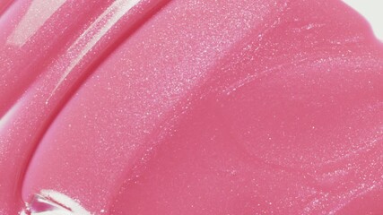 Close up of spatula smear pink shimmering lip gloss texture, satisfying texture stroke. Cosmetic product swatch background - Powered by Adobe