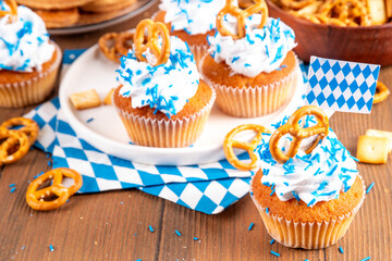 Oktoberfest cupcakes with pretzel and colorful sugar sprinkles