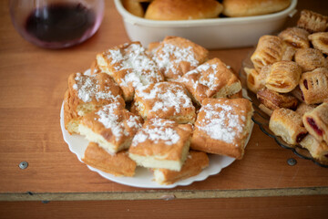 Sweet pastries on the table. Homemade cakes. Lots of sweet treats.