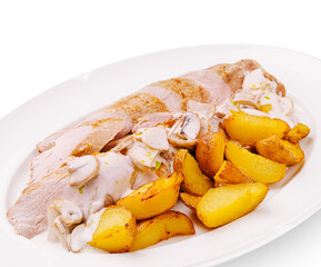 Tasty roasted chicken with seasoned potatoes and creamy sauce