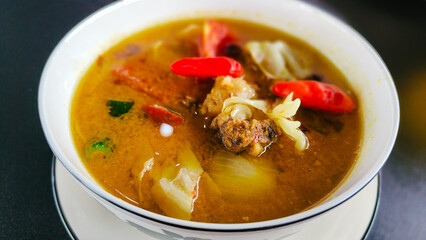 Beef tongseng served in a bowl