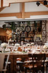 Naklejka premium Rustic boho wedding with couple, decorations, flowers and celebration in vintage barn