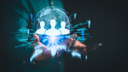 Businessman holding digital globe with human icons, representing global communication, social network, teamwork, online community, digital marketing, people connection and virtual collaboration.