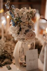 Rustic boho wedding with couple, decorations, flowers and celebration in vintage barn
