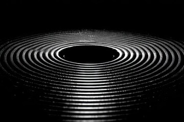 Obraz premium Black and white concentric circles, dark background