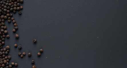 Dark Surface with Spherical Objects, Textured Ground, Dark Background.