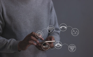 Young man hand using smartphone with to Interconnect, Interconnected Concept; People connect via wireless internet in a world of digital technology and communications that connect