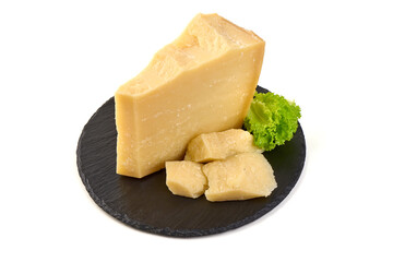 Wedge of aged Parmesan cheese on Slate Plate, isolated on white background