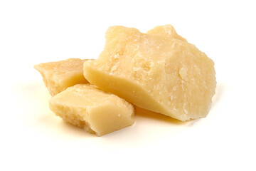 Pieces of aged Parmesan cheese on Slate Plate, isolated on white background