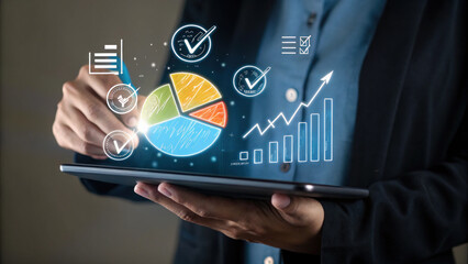 Tablet displaying colorful pie chart and rising bar graph with business analytics overlay, modern professional using touchscreen, optimistic data