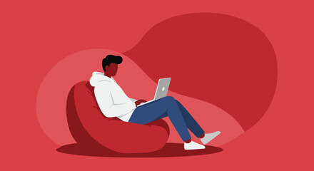 Young person casually working or studying on a laptop while relaxing on a comfortable bean bag chair at home. Ideal for remote work, education, or digital lifestyle concepts.