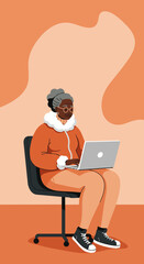 Focused senior African American woman learning or working on a laptop. Depicts digital literacy, technology adoption, and active modern senior lifestyle.