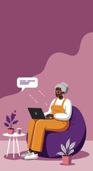 Senior Black woman comfortably using a laptop at home, embracing technology for communication and online activities. Ideal for modern lifestyle and digital literacy concepts.