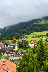 Landscape of traditional village on misty mountain
