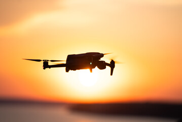 Drone Flying at Sunset Over the Sea