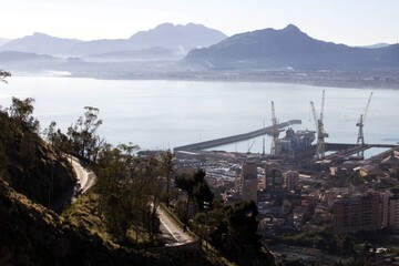 Palermo shipyard in Italy, ships in storage and cranes in the shipyard