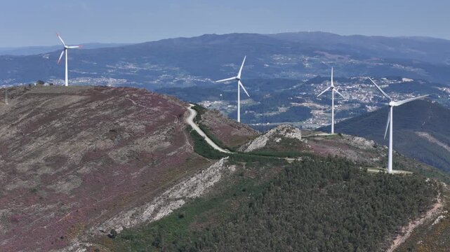 A wind turbine farm on the top of a mountain in Portugal