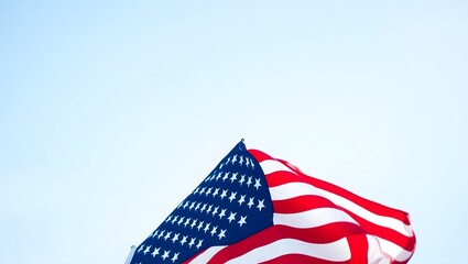 Obraz premium Premium patriotic holiday backdrop featuring waving USA flag in bottom corner and smooth blue copy side