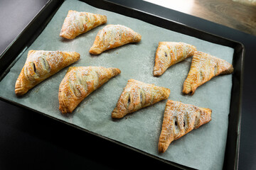 Puff pastry triangles with jam. Dessert. Pastry. Dough