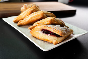 Puff pastry triangles with jam. Dessert. Pastry. Dough