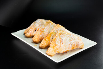 Puff pastry triangles with jam. Dessert. Pastry. Dough