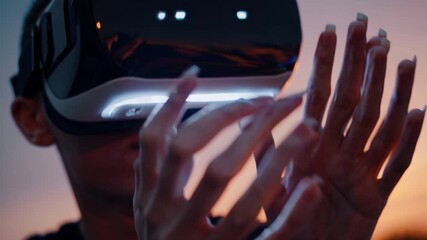 Man Immersed in Virtual Reality, Puffing Cigarette amidst a Sunset Backdrop Ideal for HighEnergy Campaigns, Boosting Creativity and Engagement.