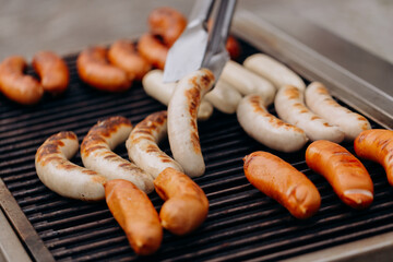 grilled sausages on the grill, sausages on grill