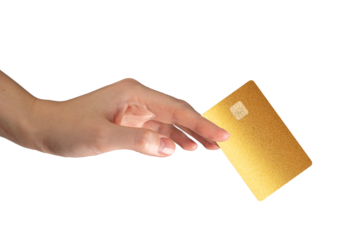Hand holding a golden glitter bank card with chip isolated on white background. Concept of luxury