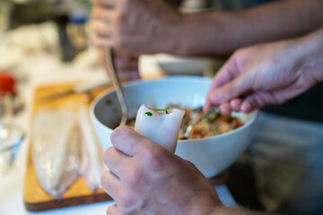 Pre-stuffed squid with rice and vegetables in Mediterranean style for grill