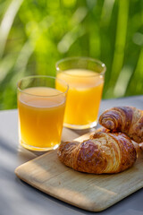 orange juice and croissants