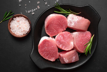 Raw uncooked pork tenderloin medallions