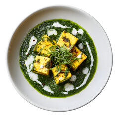 Close up of a white bowl with Indian palak paneer on transparent background. Fresh spinach puree...