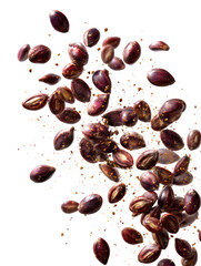 Obraz premium Grape seeds scattering and falling from above on white background