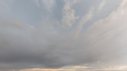 Cloudy sky with soft sunlight and dramatic atmosphere. Perfect for weather, climate, nature, environment, and background design. Ideal for websites, blogs, presentations, educational projects, and adv