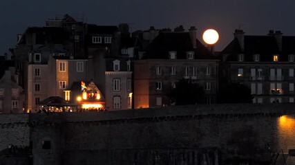 Full moon rising above Saint-Malo in Brittany France