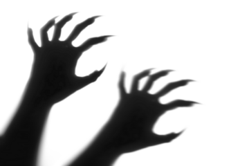 Shadow overlay effect for halloween background with Terrifying scary hands with long nails,Creepy monster claw,silhouette of hands,zombie hand rising out of a graveyard