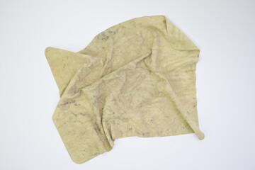 Old dirty cleaning cloth isolated on white background, concept of hygiene, household chores, and...
