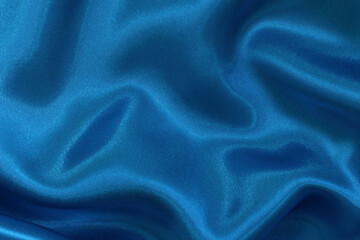 Blue fabric cloth texture for background and design art work, beautiful crumpled pattern of silk or linen.