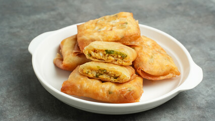 Martabak Tahu or Tofu Spring Rolls, filled with tofu, leek and egg. Indonesian food
