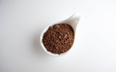 chocolate crumbs on a white background