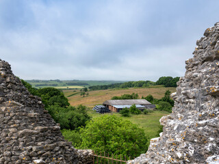 landscape in south dorset with farm seen from corfe castle