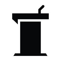 Microphone on top the podium is rectangular in shape and has a flat base