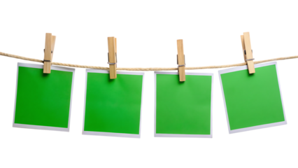 Row of Four Green Chroma Key Polaroid Frames Pinned on Rope with Clothespins – Isolated on White or Transparent Background, PNG, AI Generated