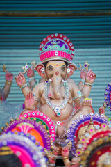 Lord Ganesha idol for Ganesh Chaturthi festival in India, Colorful Ganpati statue Stock Photo, Lord...