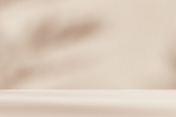 Empty brown cream beige room studio with shadow of leaves for product presentation. Autumn background. Summer tropical backdrop. Cosmetic showroom.